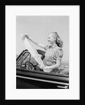 Young Woman Reading Road Map by Anonymous