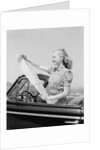 Young Woman Reading Road Map by Anonymous
