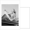 Young Woman Reading Road Map by Anonymous