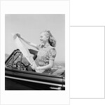 Young Woman Reading Road Map by Anonymous