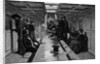 Men And Women In Steamer Cabin by Anonymous