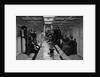 Men And Women In Steamer Cabin by Anonymous