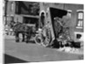 Horsedrawn Trash Cart Dumping In Street by Anonymous