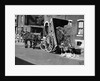 Horsedrawn Trash Cart Dumping In Street by Anonymous