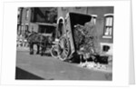 Horsedrawn Trash Cart Dumping In Street by Anonymous