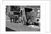 Horsedrawn Trash Cart Dumping In Street by Anonymous