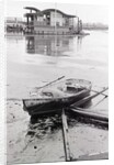 Oil-Slicked Boat Washed On Oiled Beach by Anonymous