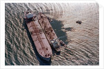 Tanker Pumping Oil From Exxon Valdez by Anonymous