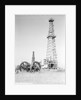 Oil Derricks In Field by Anonymous