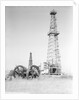 Oil Derricks In Field by Anonymous
