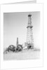 Oil Derricks In Field by Anonymous
