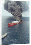 Dark Smoke Rising from Burning Mega Borg Oil Tanker by Anonymous