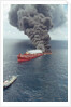 Dark Smoke Rising from Burning Mega Borg Oil Tanker by Anonymous