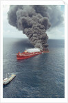 Dark Smoke Rising from Burning Mega Borg Oil Tanker by Anonymous