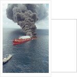 Dark Smoke Rising from Burning Mega Borg Oil Tanker by Anonymous