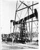 Oil Derrick Pumping Closer Up by Anonymous