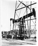 Oil Derrick Pumping Closer Up by Anonymous