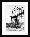 Oil Derrick Pumping Closer Up by Anonymous