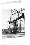 Oil Derrick Pumping Closer Up by Anonymous
