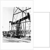 Oil Derrick Pumping Closer Up by Anonymous