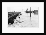 River Flood Waters Wash Around Rr Trestl by Anonymous
