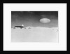 Ufo Over Barn In Snow Covered Field by Anonymous