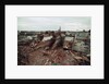 Destroyed Buildings Overflow Alleys by Anonymous