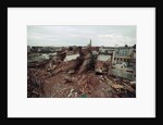 Destroyed Buildings Overflow Alleys by Anonymous
