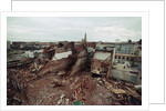 Destroyed Buildings Overflow Alleys by Anonymous