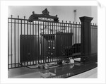 Iron-Grilled Mortgage Window by Anonymous