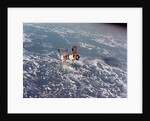 Skylab Space Station in Orbit Over Earth by Anonymous