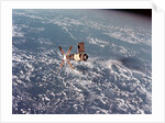 Skylab Space Station in Orbit Over Earth by Anonymous