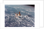 Skylab Space Station in Orbit Over Earth by Anonymous