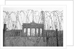 Barbed Wire and Brandenburg Gate by Corbis