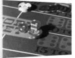 Chips and Dice on Craps Table by Anonymous