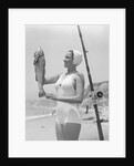 Female Fisherman Showing Her Catch by Anonymous