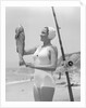 Female Fisherman Showing Her Catch by Anonymous