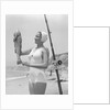 Female Fisherman Showing Her Catch by Anonymous