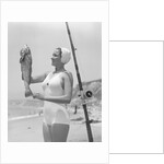Female Fisherman Showing Her Catch by Anonymous