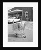 Shopping Cart In Grocery Parking Lot by Anonymous