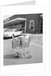 Shopping Cart In Grocery Parking Lot by Anonymous