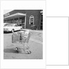 Shopping Cart In Grocery Parking Lot by Anonymous