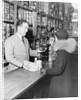 Woman and Grocer by Anonymous