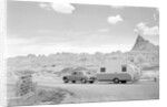Automobile & Trailer On Badlands Highway by Anonymous
