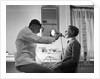 Doctor Examining Boy Patient by Anonymous