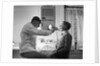 Doctor Examining Boy Patient by Anonymous
