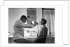 Doctor Examining Boy Patient by Anonymous