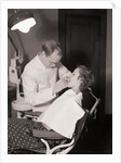 Dentist Examining Patients Teeth by Anonymous