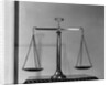 Balancing Scales On Table by Anonymous