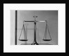 Balancing Scales On Table by Anonymous